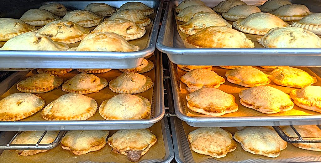 Oven-baked Empanoli hand pies fresh from the oven